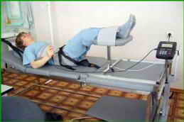 Времена года. Реабилитационное отделение. Сухое вытяжение позвоночника на тракционном столе TRA Computer